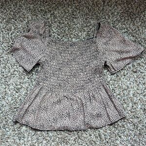 Cut cheetah top from urban romantics , size small no tears and stains